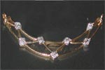Code KJDP TN-123Gold 18 ktWeight 7.200 gmsDipc. 28Diamond 0.35 ctRs 12,000/-, click here to see large picture.